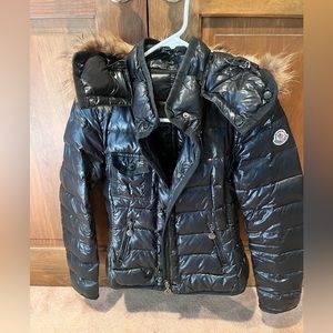 The Armoise down jacket. Black Moncler jacket with Fur.Size 0. Good condition.
